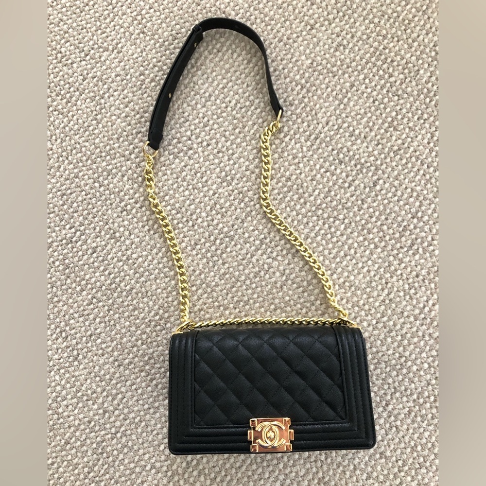 Black lookalike bag. Never used.